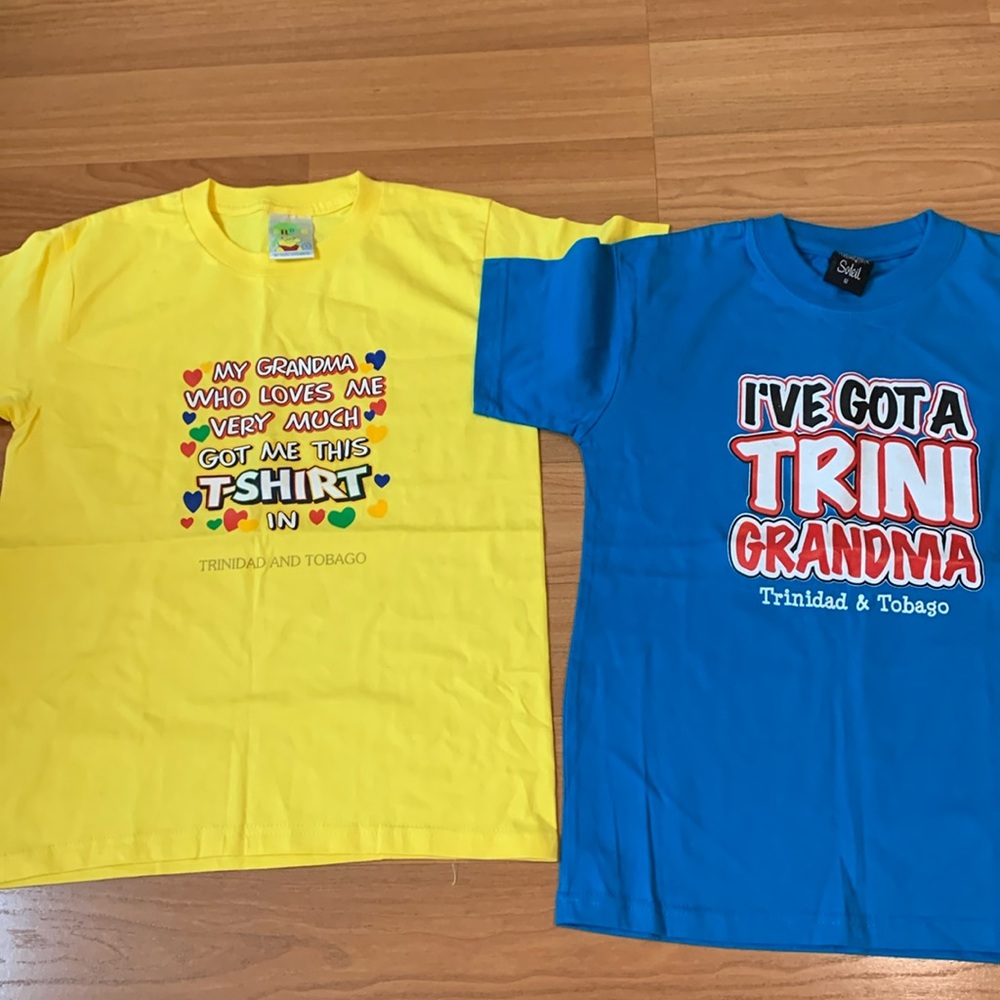 Two souvenir T-shirts from Trinidad size 12 and size large unisex kids